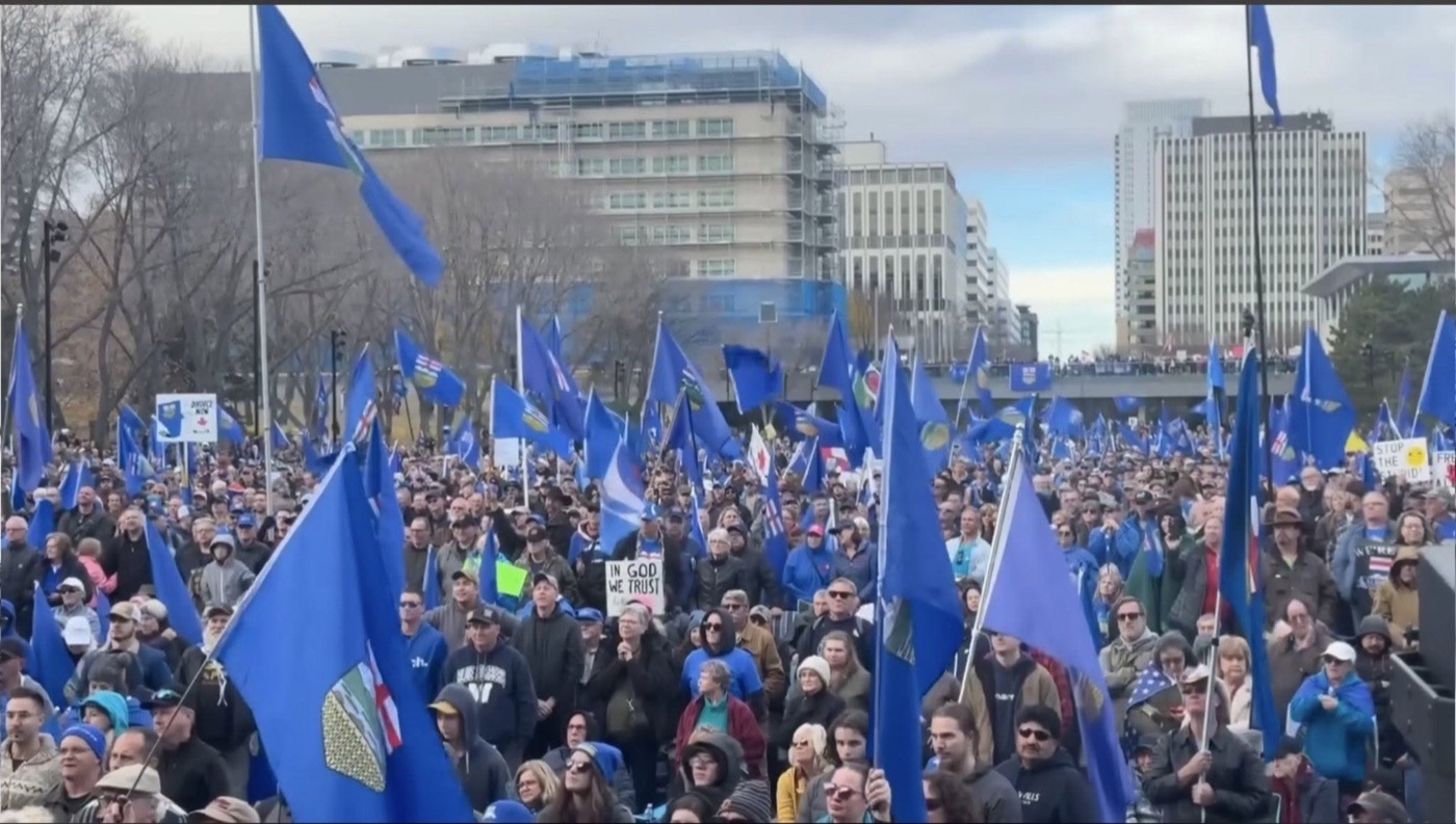 Sea of Alberta flags at a rally